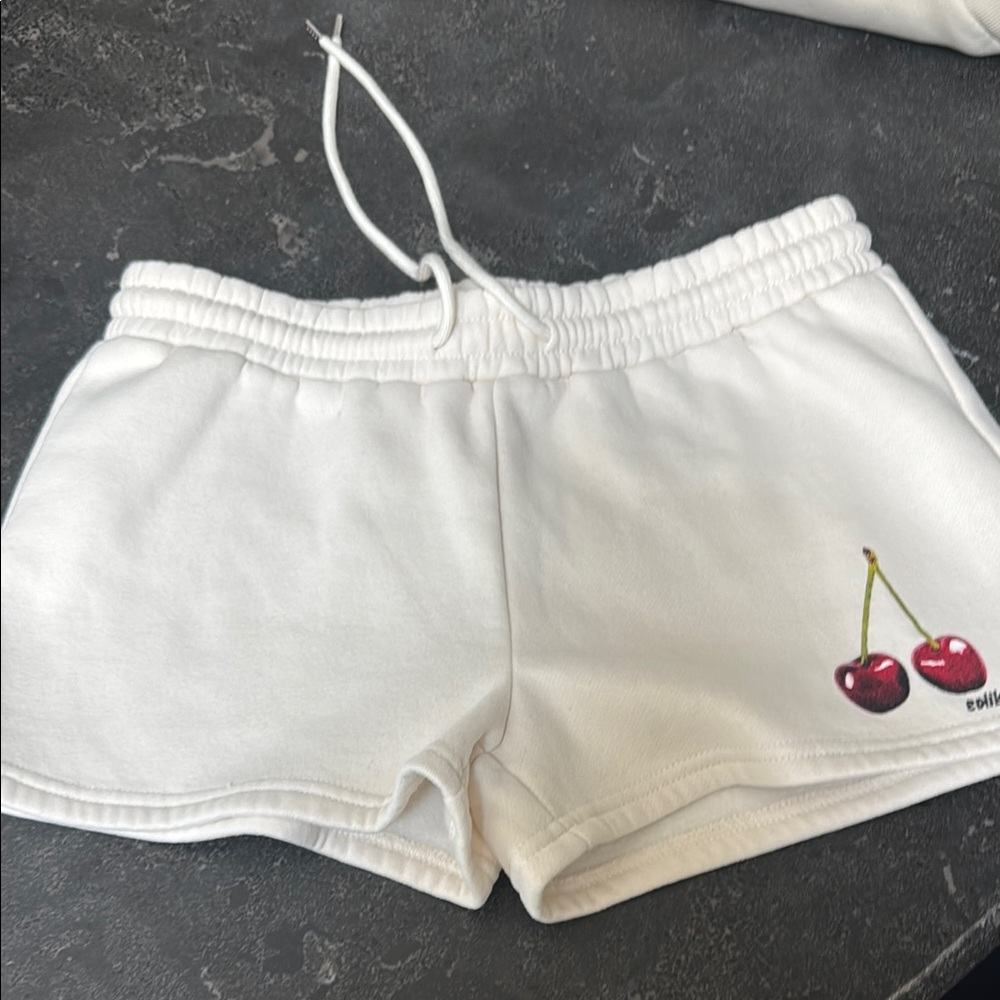 Edikted White Athletic Shorts with Cherry Design